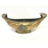 A late 19th century brass Scandinavian dish with a