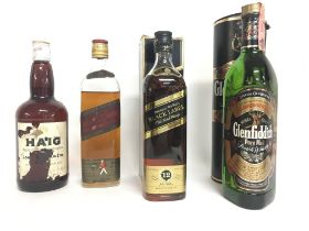 A collection of various whisky including Haig, Joh