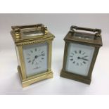 Two brass carriage clocks. Shipping category D.