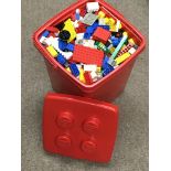 A box of various Lego pieces. Postage category C