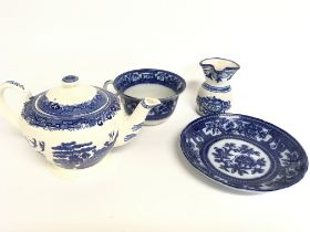 A collection of blue and white ceramics including