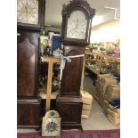 A mahogany long case clock case together with two movements- brass dial and silver dial- Mich