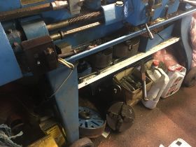 A large Colchester engineering Lathe with accessor