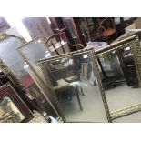 Four gilt framed modern mirrors