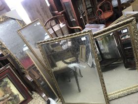 Four gilt framed modern mirrors