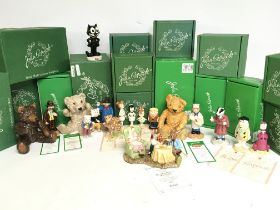 A collection of boxed Wade figures including Alice