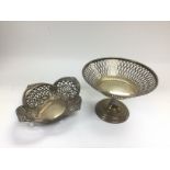 Two silver dishes with piercework decoration, larg