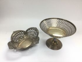 Two silver dishes with piercework decoration, larg