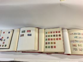 A collection of stamp albums from various countrie