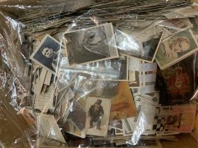 Mixture of cigarette and trade cards in box