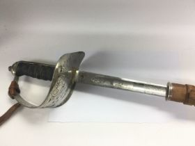 A George V officer's sword with scabbard. Shipping