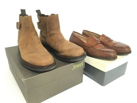 A pair of Jones Shooter 115 boots & a pair of Aman