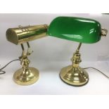 A reproduction brass table lamp and one other (2). Shipping category D.