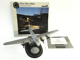 A Franklin mint die cast model of the B-17G Flying Fortress with paperwork. Postage B