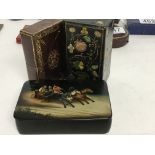 A small Russian lacquer box painted with horse and