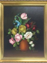 A gilt framed oil on canvas still life of flowers,