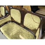 A Edwardian suite comprising two seater sofa open