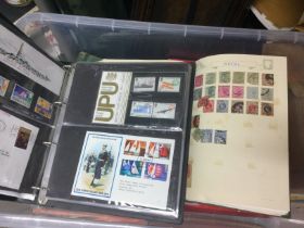 A box containing Commonwealth and GB postage stamp