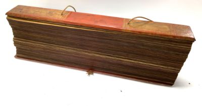 An Early 20thC palm leaf scripture with lacquered