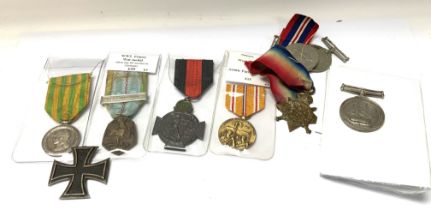 A collection of European military service medals i