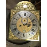 A brass clock movement - William Kipling London. 40cm in height together with one other movement