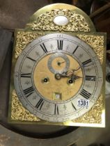 A brass clock movement - William Kipling London. 40cm in height together with one other movement