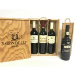 A collection of Baron De Ley Rioja wines and a St