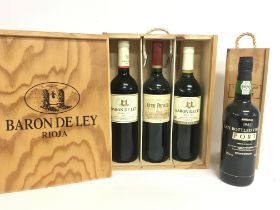 A collection of Baron De Ley Rioja wines and a St