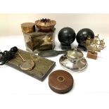 A box of small items to include a pair of polished