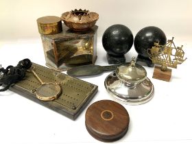 A box of small items to include a pair of polished