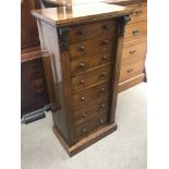 A seven drawer Mahogany Wellington chest, dimensio