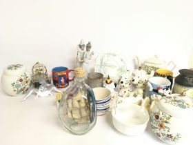 A collection of various ceramics including a ship