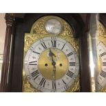 A Georgian mahogany long case clock the arched dia