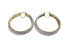 A pair of heavy stone set earring in 9ct gold. 12.