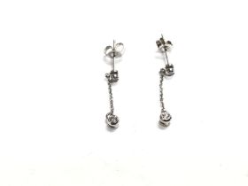 9ct white gold diamond drop earrings. 1.1g and app