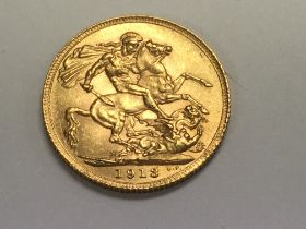 A 1913 full gold sovereign.