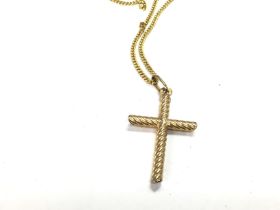 A 9ct gold cross on a 9ct chain. Total weight 5.7g