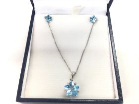 An 18ct white gold earring and necklace gemstone s