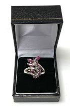 A 14K white gold and ruby ring. (A)