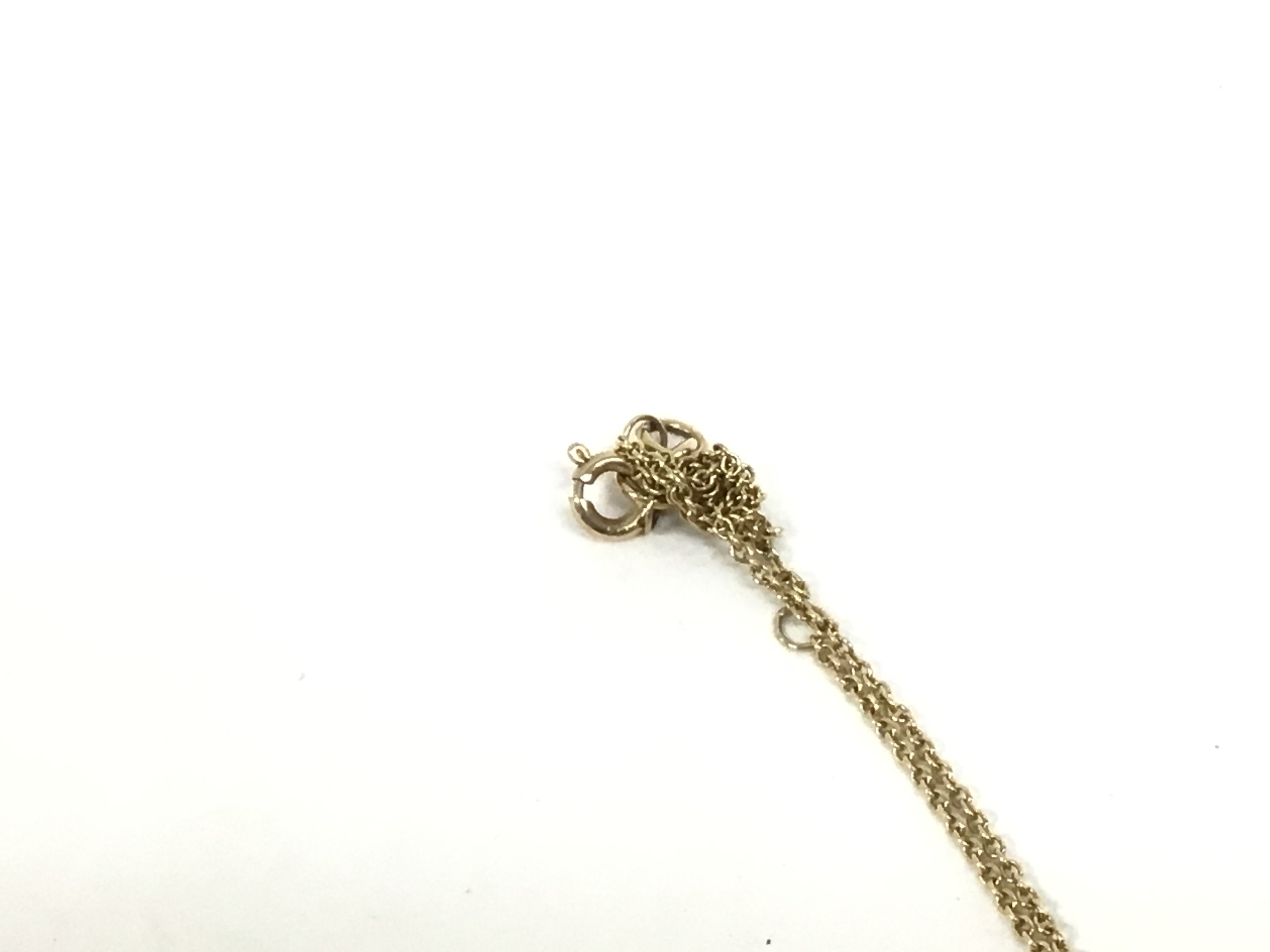 An 9ct gold pear shaped diamond pendant with chain - Image 2 of 2