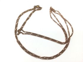 A 9ct gold watch chain. 31.8g