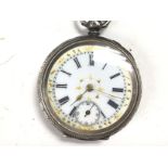 A ladies key wind silver pocket watch. Winds and r