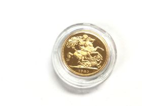 A 1980 proof sovereign with COA. Postage B