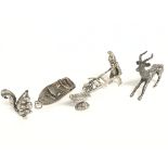 A collection of Silver miniature figurines includi