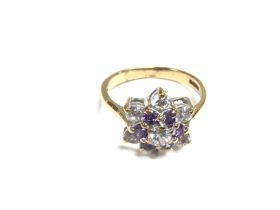 A 9ct amethyst set cluster ring. 3.5g and size N