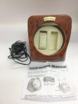 Another automatic watch winder with wood effect finish, instructions and power supply. Shipping