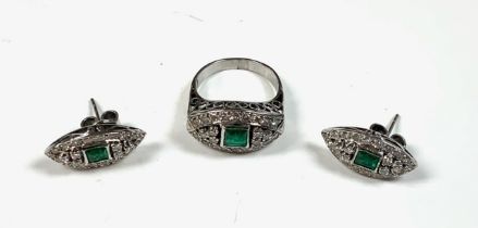 A 14ct white gold 1920s emerald and diamond set cl