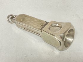 A silver hallmarked cigar cutter, postage category