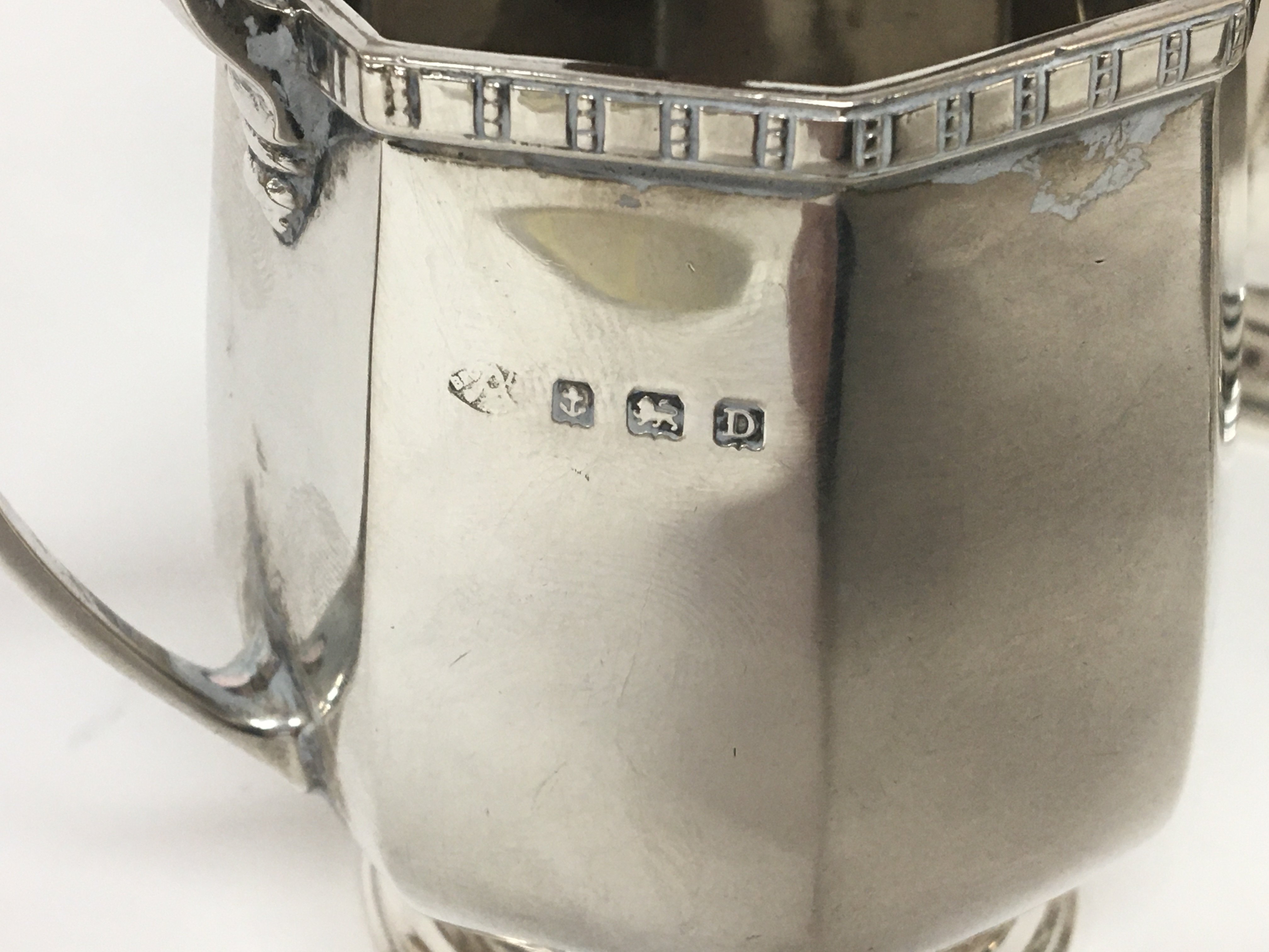 A Silver three piece tea set with Birmingham 1928 - Image 2 of 2