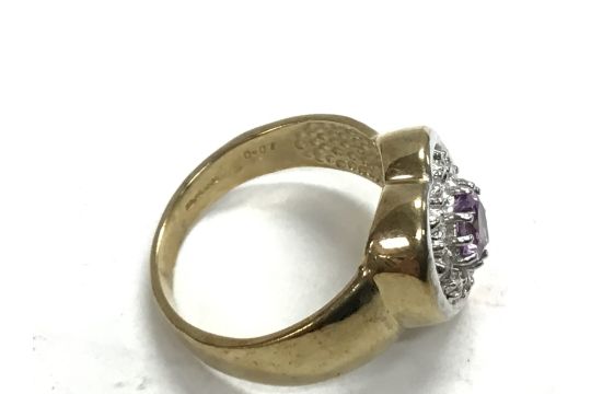 A 9ct amethyst and diamond heart ring. 5.1g and N - Image 2 of 2